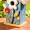 Glitzhome® 10.25" Retro Blue Distressed Flower Birdhouse